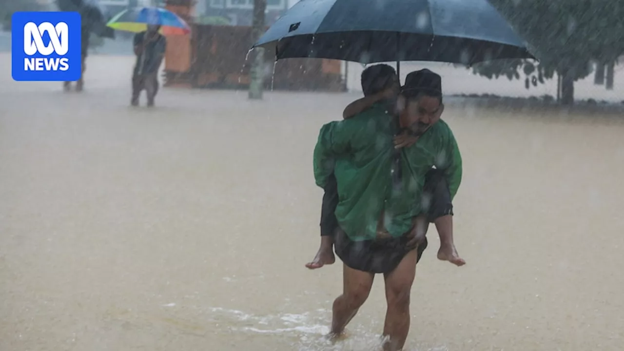 Death toll rises to 12 as Thailand and Malaysia face worst floods in decades