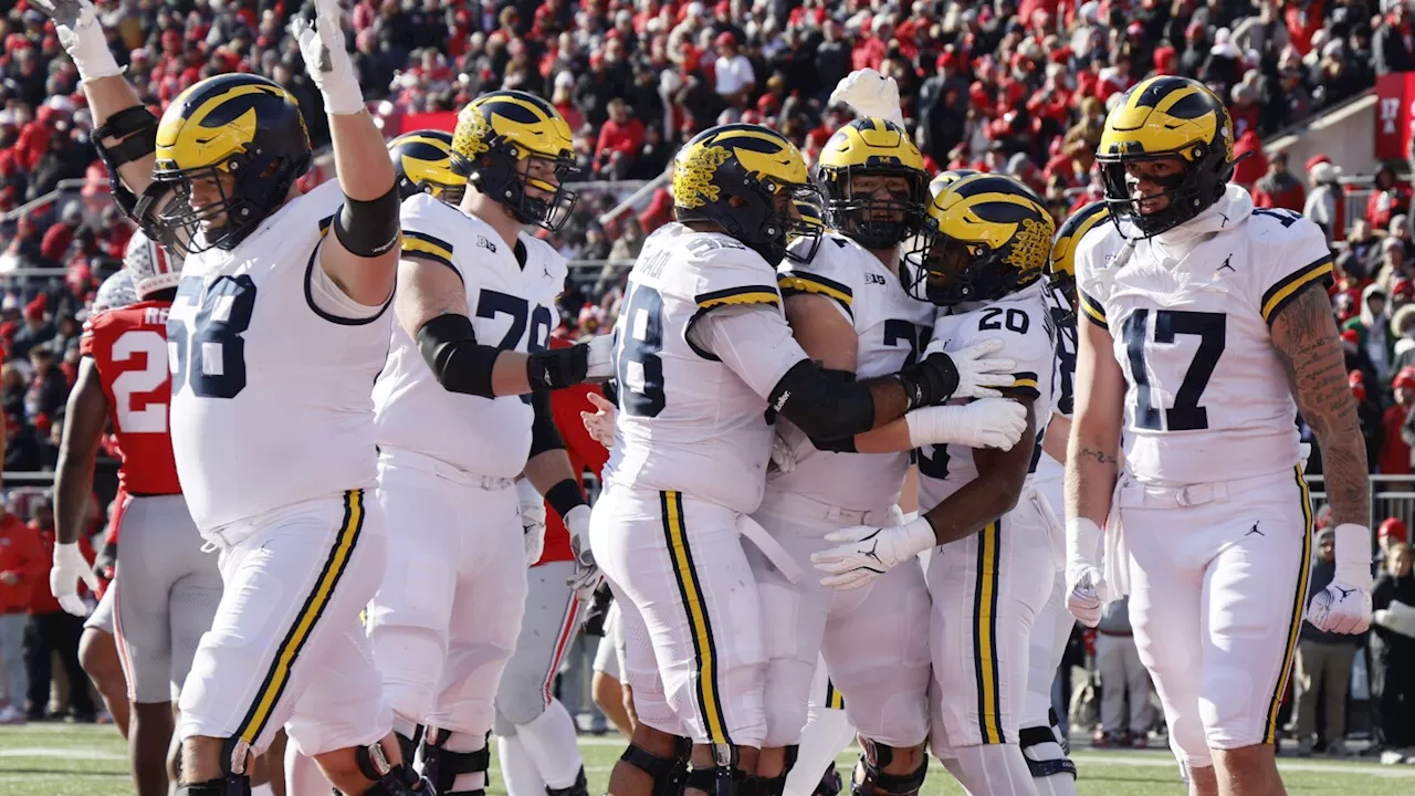 College football players scuffle after flags come out following rivalry wins