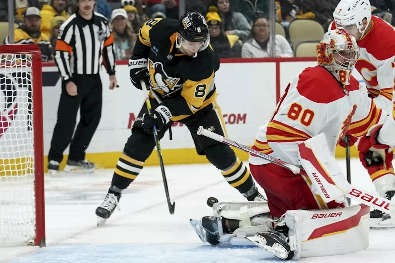 Bunting, Letang lead Pittsburgh Penguins in 6-2 win over Calgary Flames