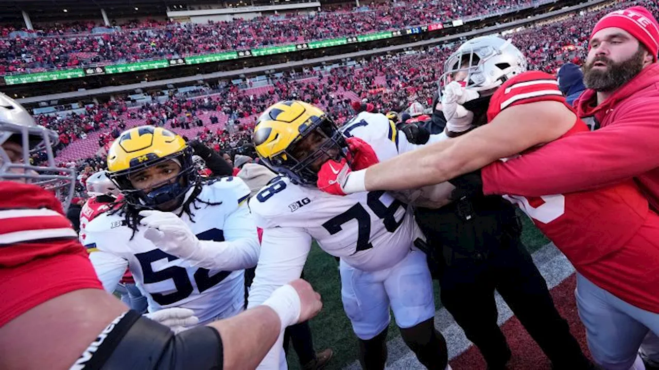 ‘Unsportsmanlike’ flag planting causes chaos over college football rivalry weekend