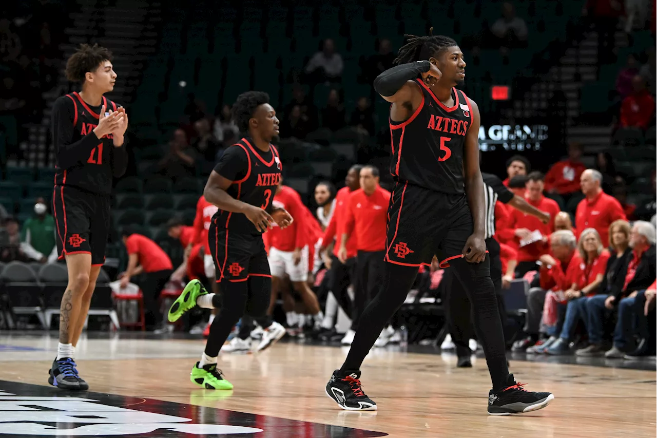 Hoops hysteria! Aztecs come from behind to beat 6th-ranked Houston in Las Vegas