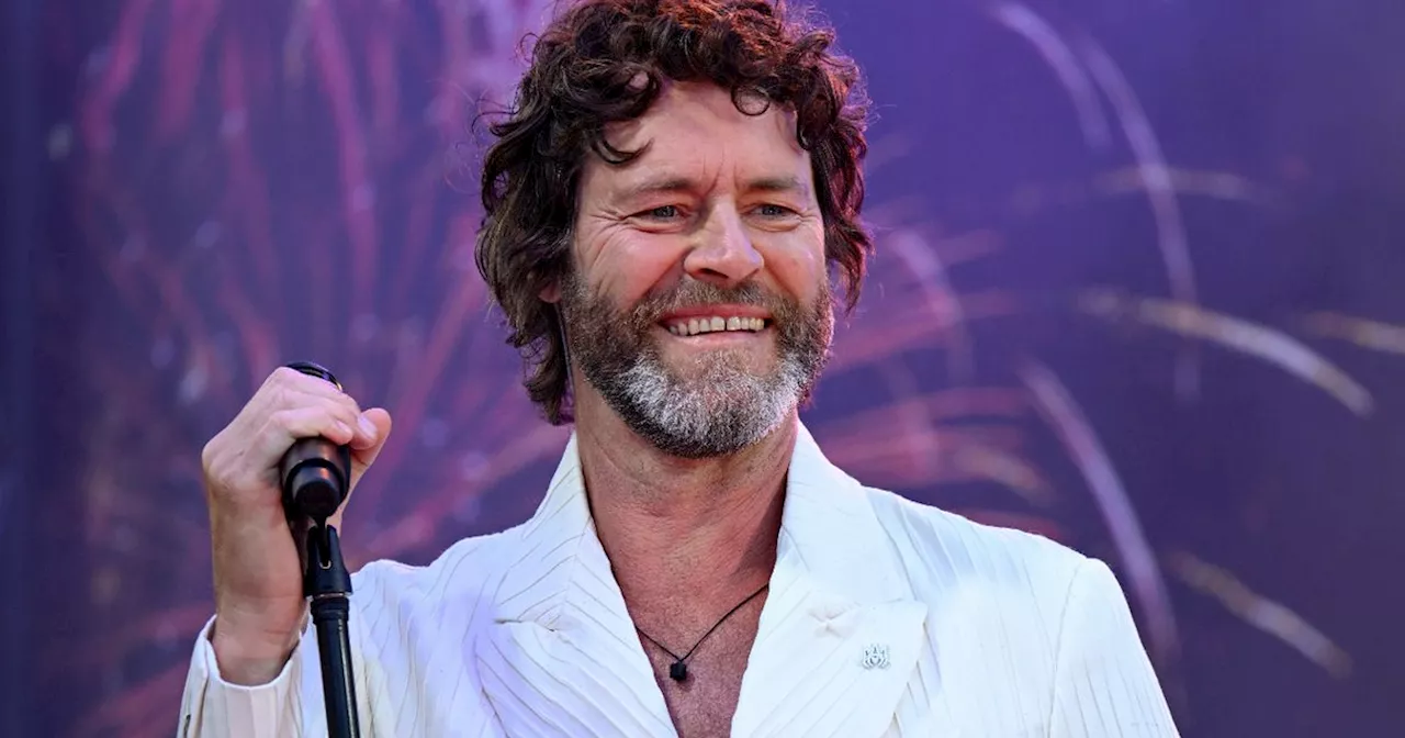 Howard Donald poses with rarely-seen sons and daughters in lavish London home