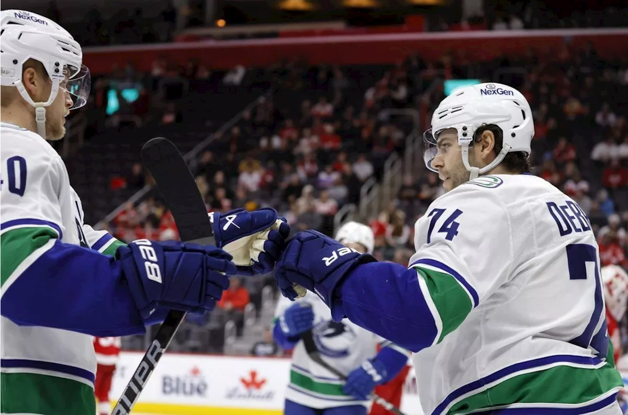 Jake DeBrusk's Hat Trick Secures Canucks Victory over Red Wings