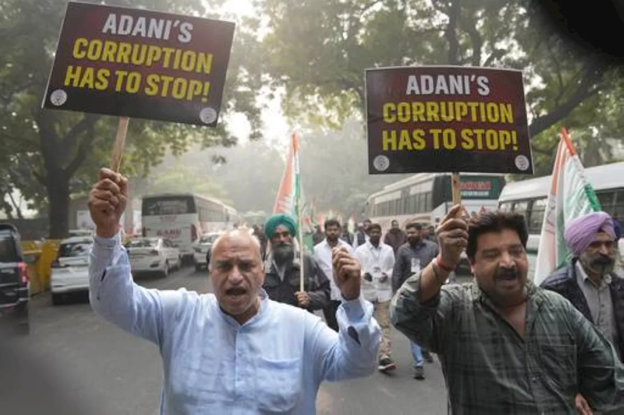 India's Adani vows to comply after fraud charges