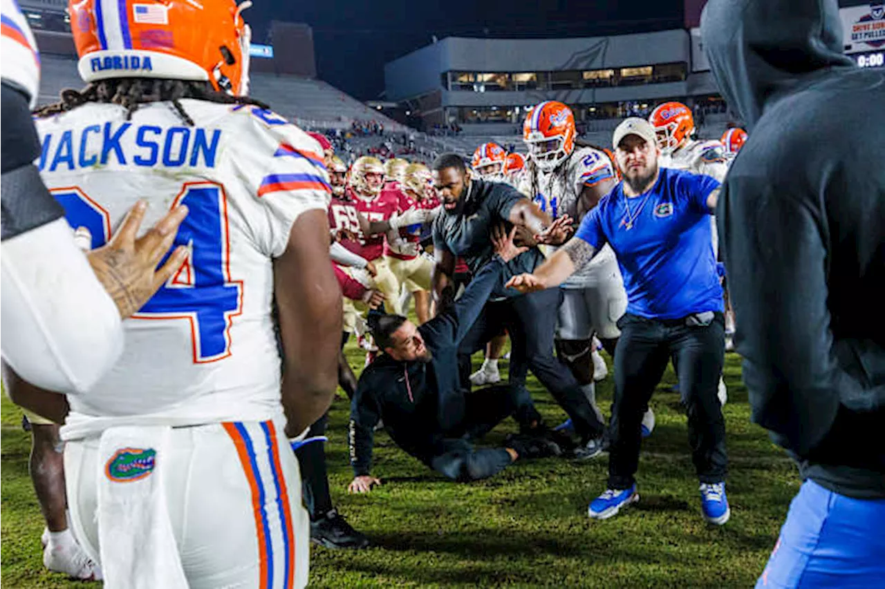 College football players scuffle after flags come out following rivalry wins