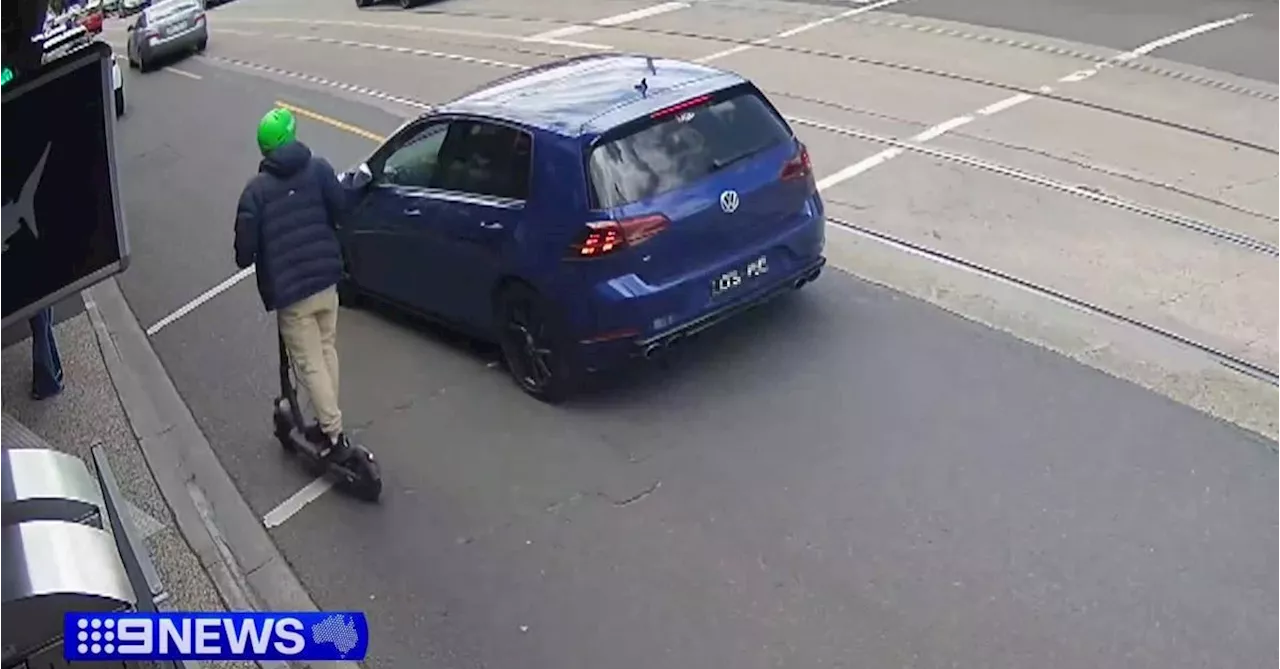 Footage shows e-scooter rider's violent road rage attack on Melbourne motorist