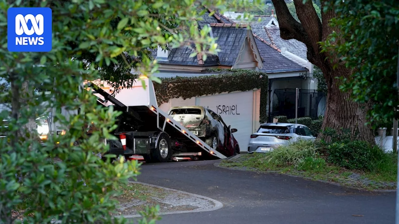 Car set alight, properties vandalised with anti-Israel graffiti at Woollahra in Sydney's east