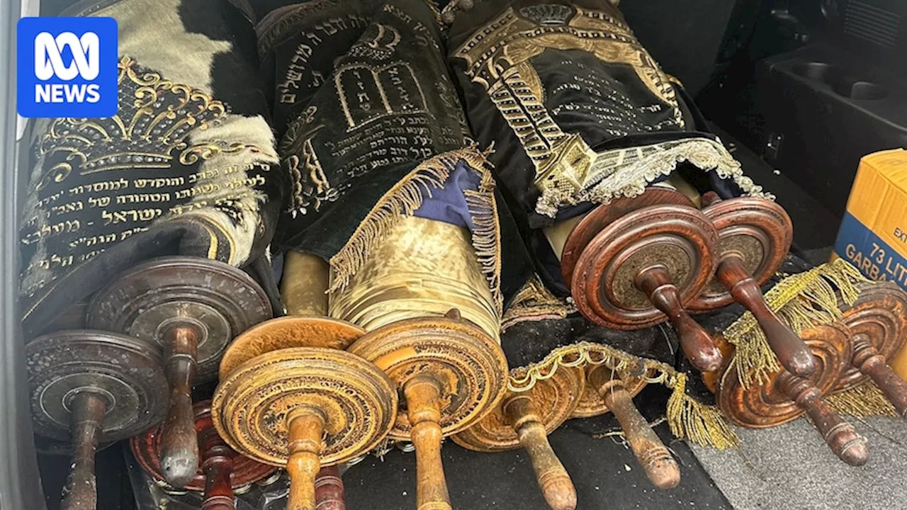 In the aftermath of Melbourne's synagogue arson attack, work begins to save priceless Torah scrolls