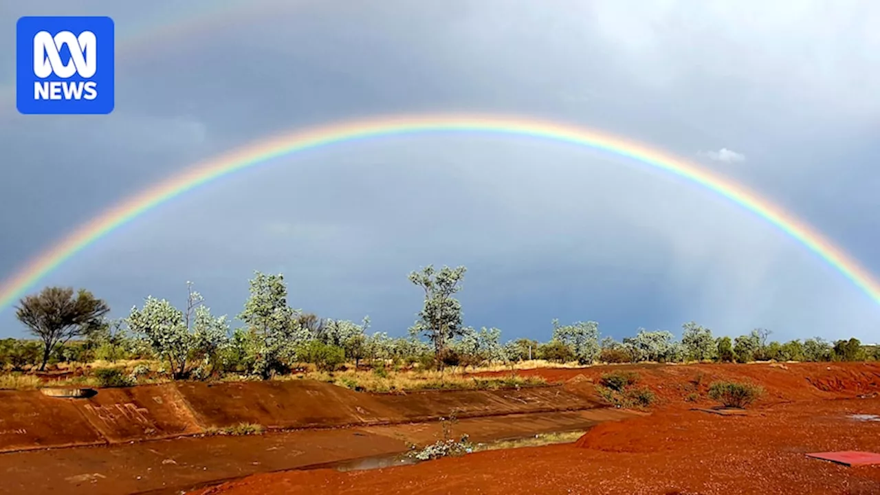 Rivers in Red Centre flow as NT graziers welcome wet start summer after 'beautiful' rainfall