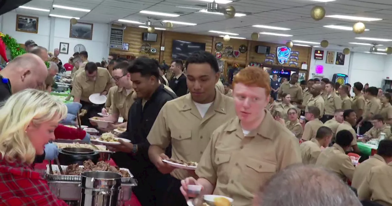 Sailors from Naval Station Great Lakes are treated to special holiday dinner northwest of Chicago