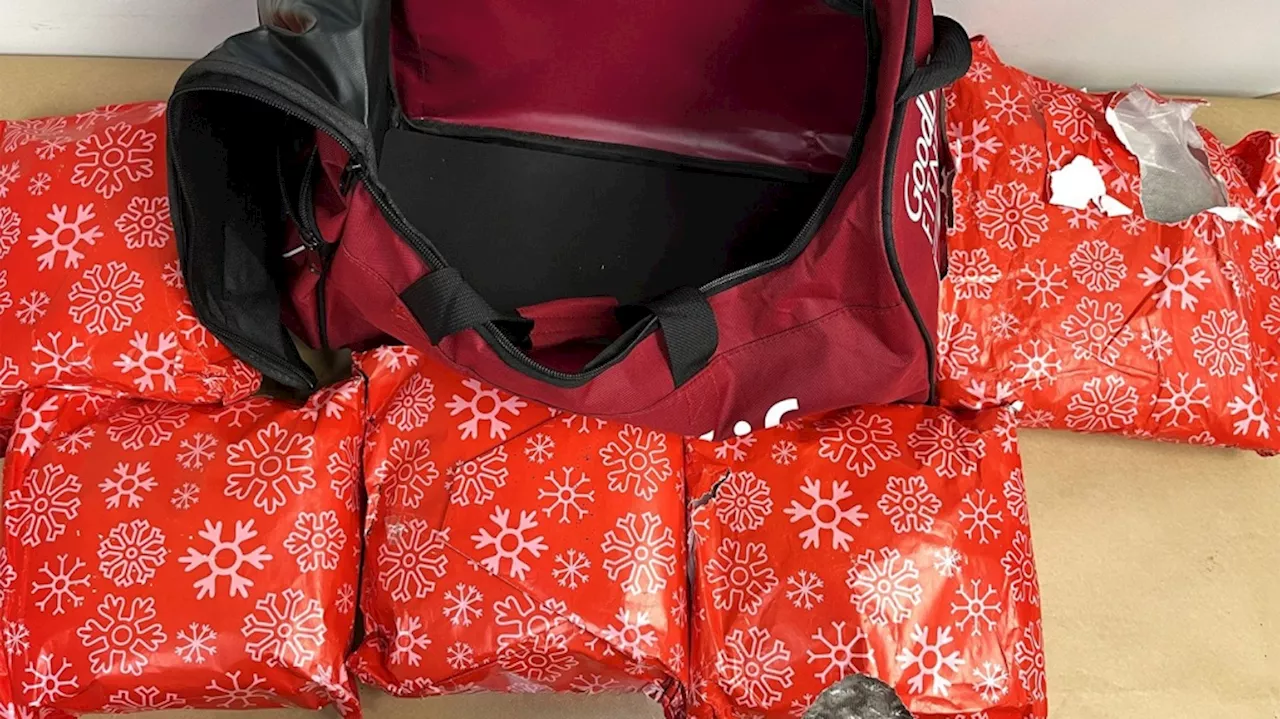 Woman arrested with 10 kg of meth wrapped as Christmas presents at New Zealand airport