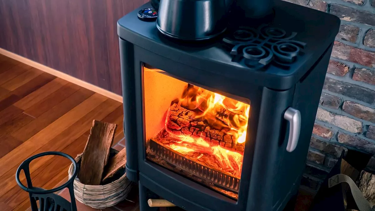 Urgent warning over trendy wood burning stoves - as research reveals they produce more pollution...