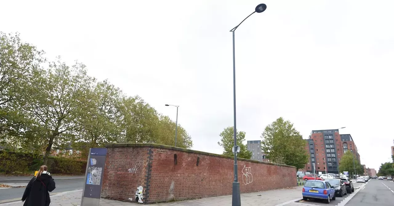 Ordinary brick wall on Liverpool street hides an underground world