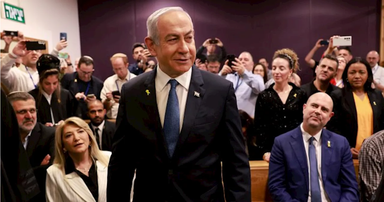 Netanyahu takes stand in his corruption trial, calls charges ‘absurd’