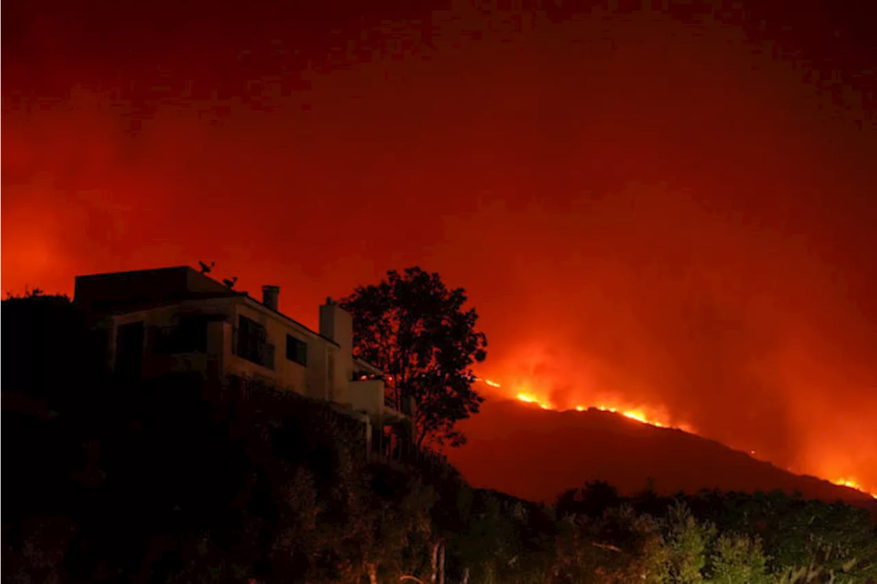 A brushfire in Malibu prompts evacuations as it burns near Pepperdine University