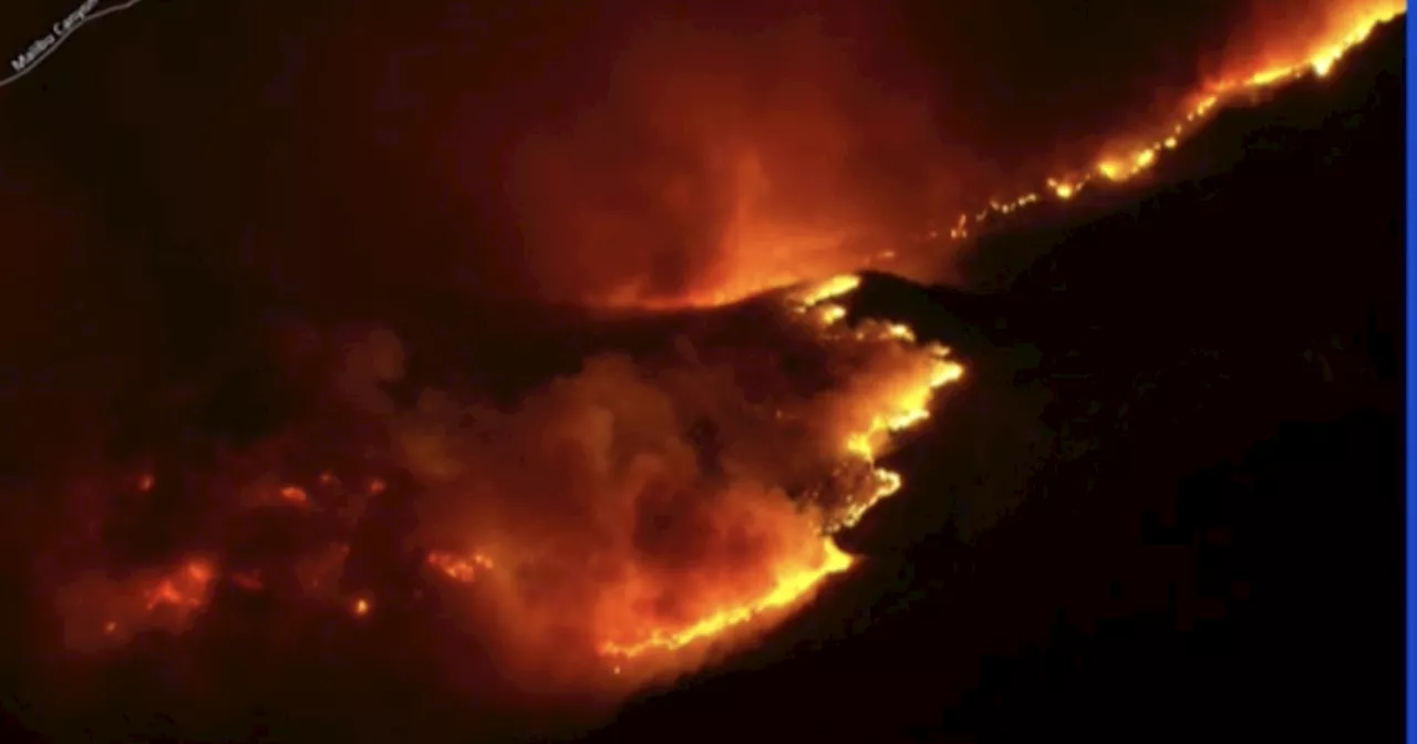 Fast-moving brush fire in Malibu prompts evacuations as Pepperdine campus shelters in place