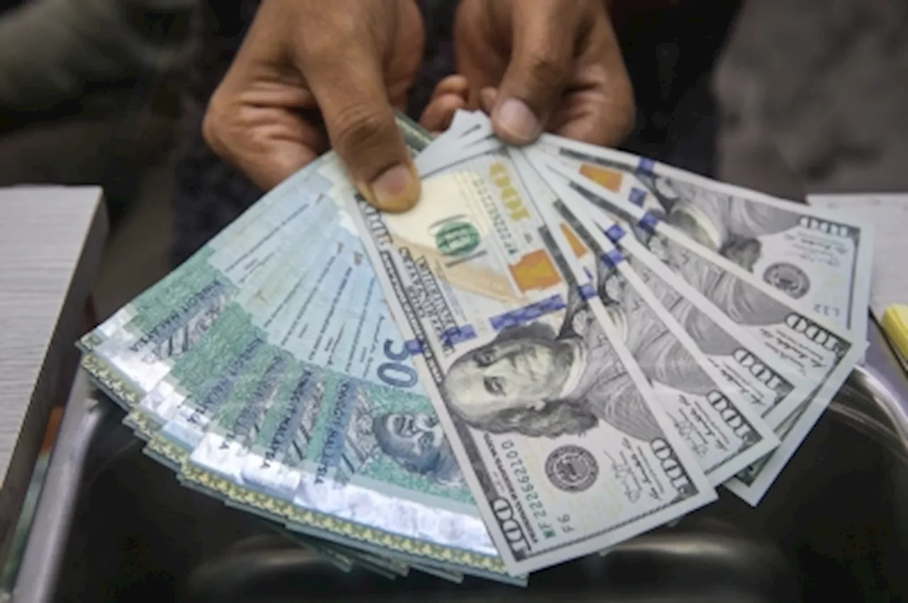 Ringgit closes slightly lower amid Mideast uncertainty, ahead of US CPI data