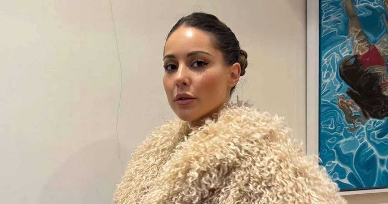 Louise Thompson's faux fur coat is the 'ultimate winter warmer'