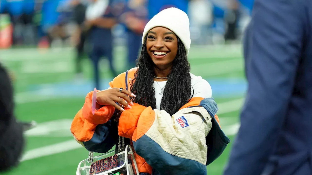 Simone Biles seduces in all-black furry fit for elevator selfie