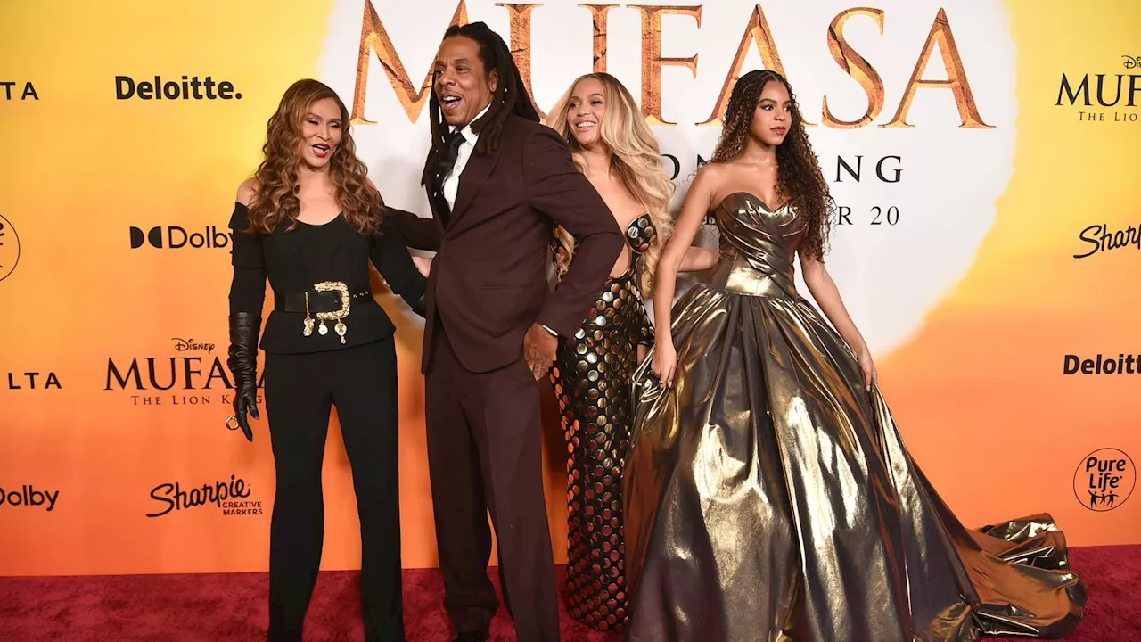 Jay-Z appears on red carpet with Beyonce and Blue Ivy after he was accused of raping girl, 13