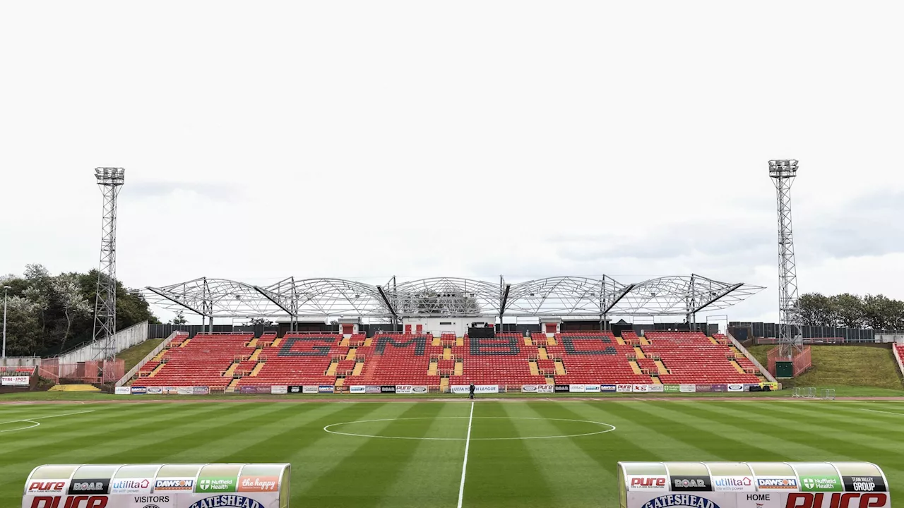 FA Trophy match abandoned as player leaves pitch in ambulance after medical emergency...