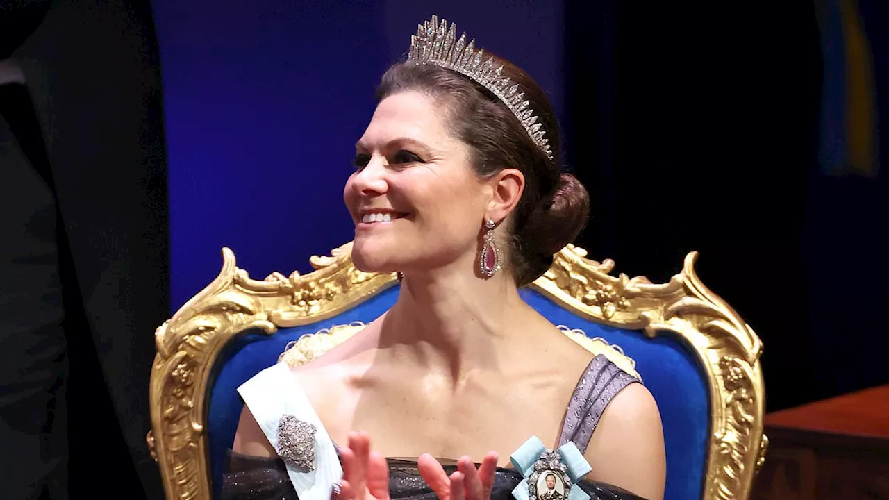 Crown Princess Victoria of Sweden is effortlessly elegant in a purple ballgown