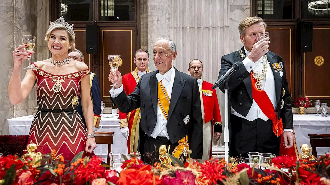 Queen Maxima of the Netherlands oozes glamour in scarlet gown - as she and King Willem-Alexander...