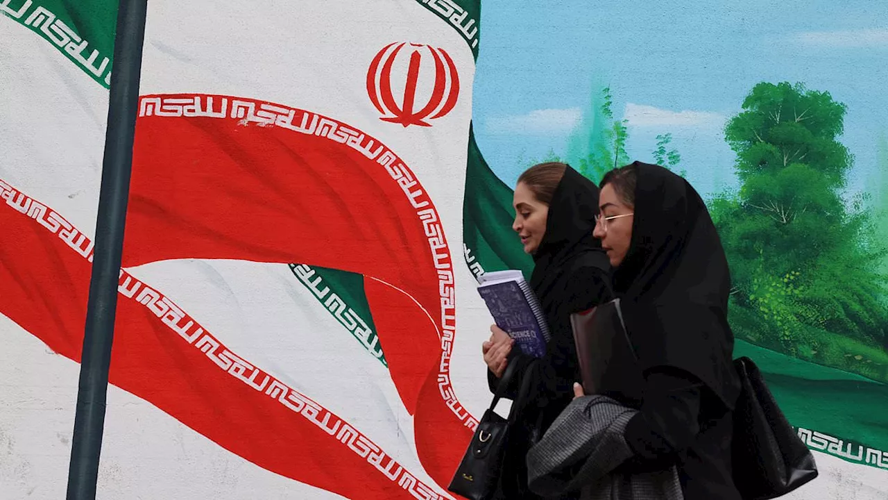 Women face the DEATH PENALTY for sending a photo of themselves without a veil under Iran's new...