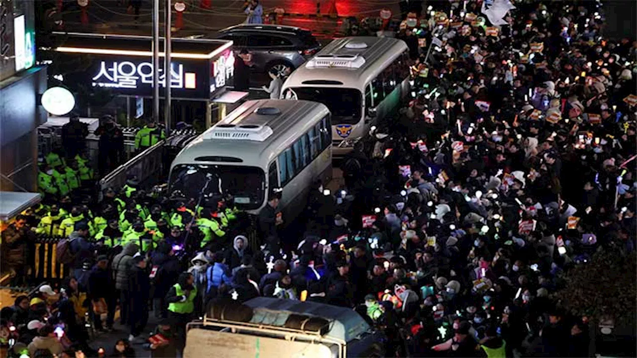 South Korea police raid Yoon's office over martial law as ousted minister attempts suicide