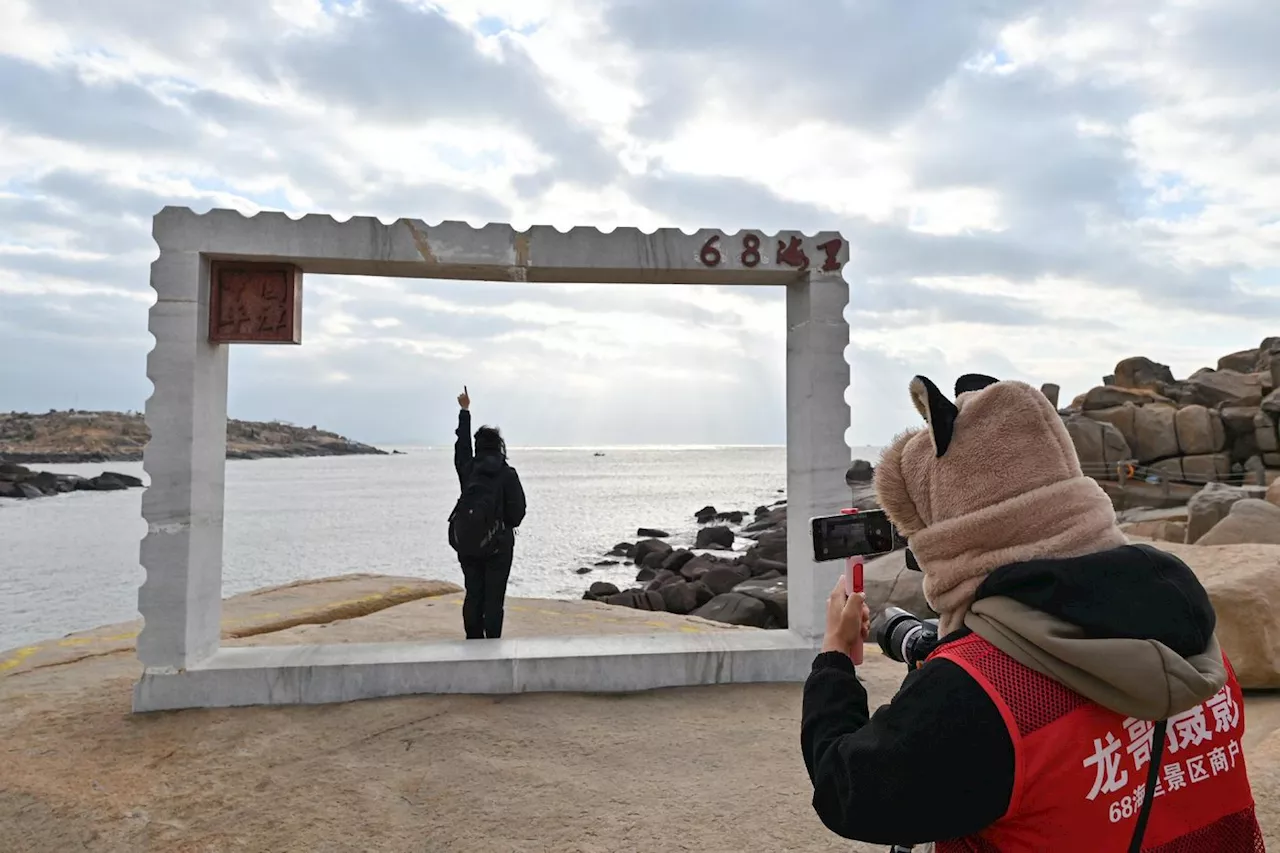 «Bientôt la réunification!»: face à Taïwan, des touristes chinois optimistes