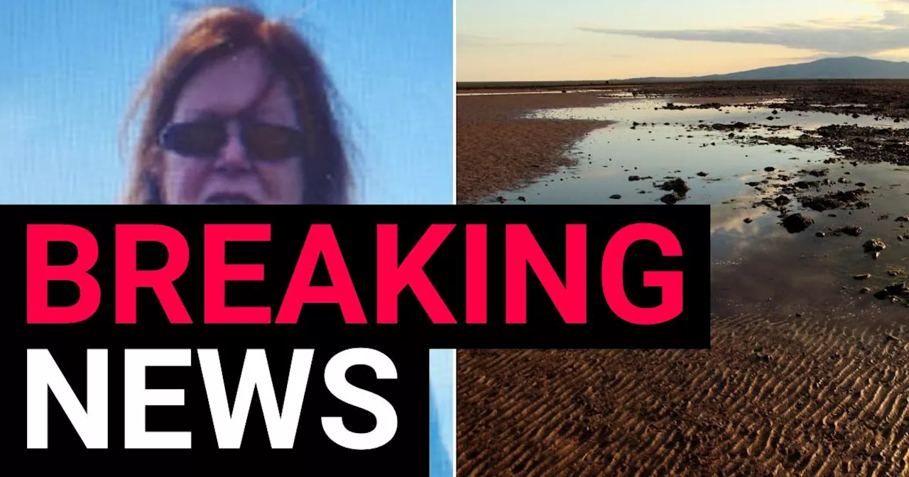 Body found in search for woman who got stuck in mud while walking near river