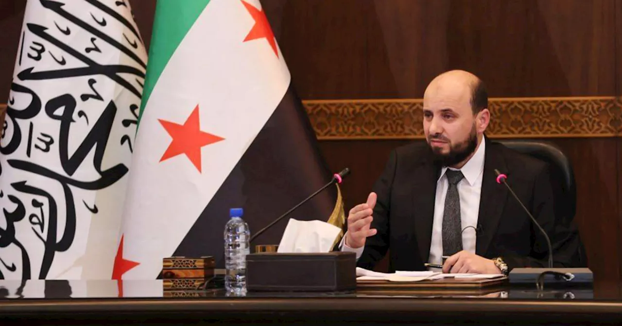 Why a photo of Syria’s interim new leader could hint at trouble ahead