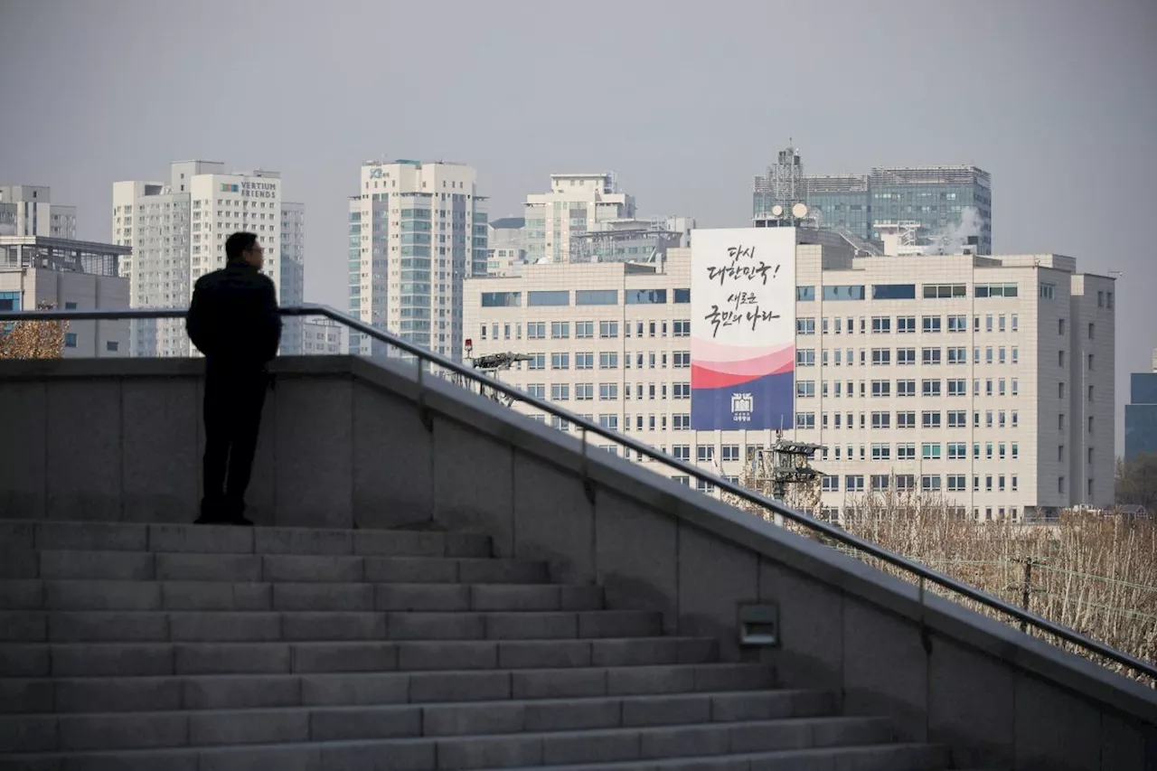 South Korea police raid Yoon’s office over martial law as ousted minister attempts suicide