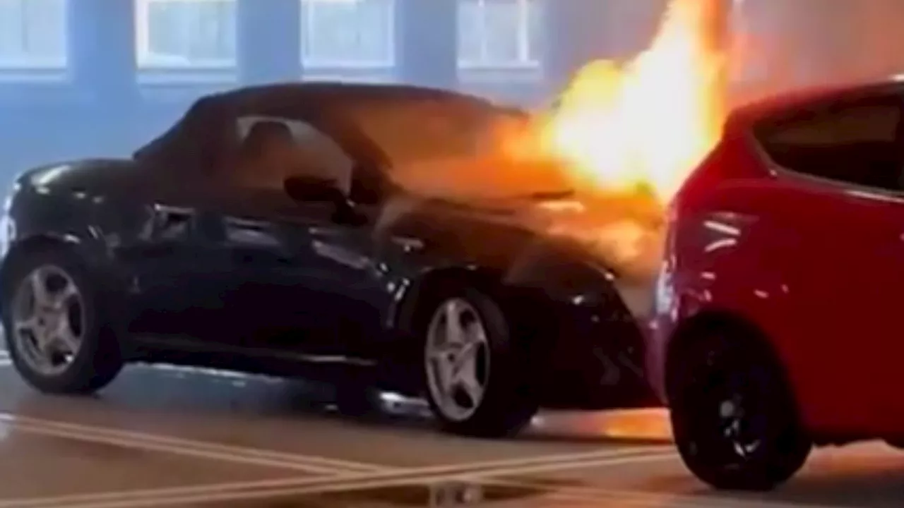 Shock moment £70k luxury car explodes in massive fireball at shopping centre car park metres from...