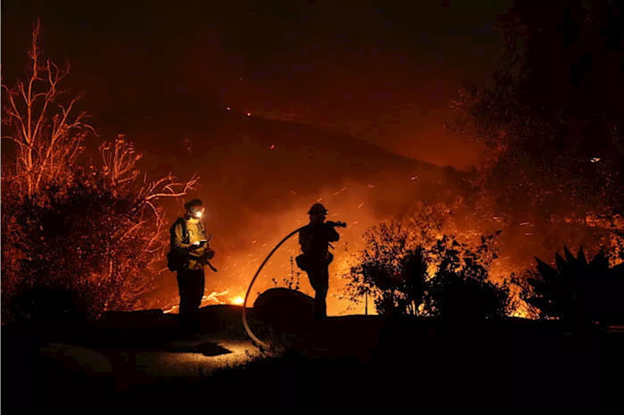 A Malibu wildfire prompts evacuation orders and warnings for 20,000, including Dick Van Dyke, Cher