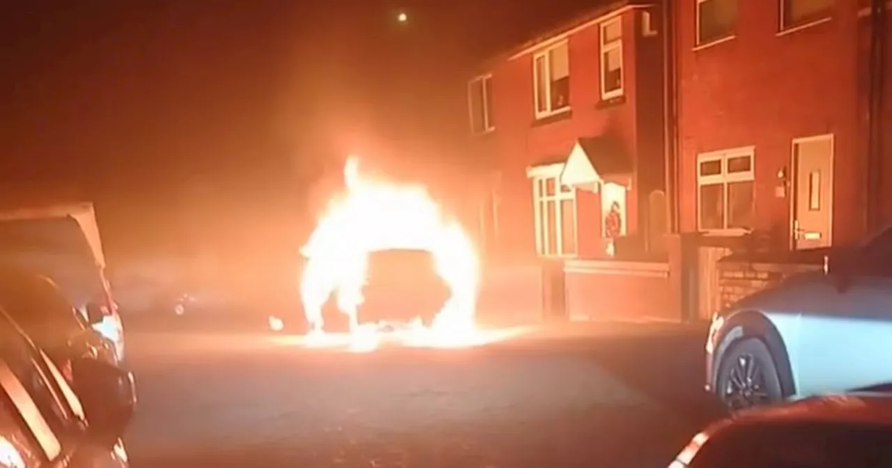 Explosion heard as car 'set alight' in suspected arson attack outside home