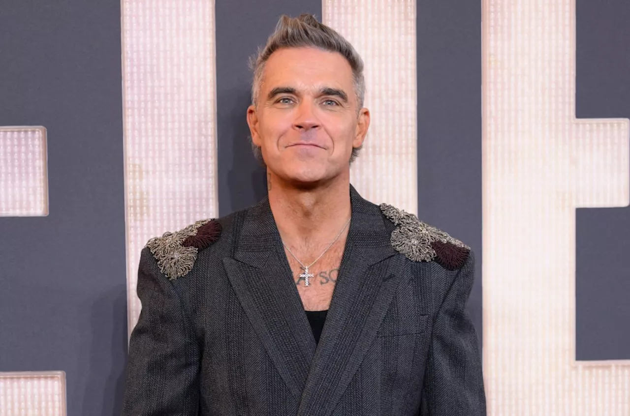 Robbie Williams Addresses Rumors About His Sexuality, Saying He ‘Wants to Be Gay,’ But Isn’t