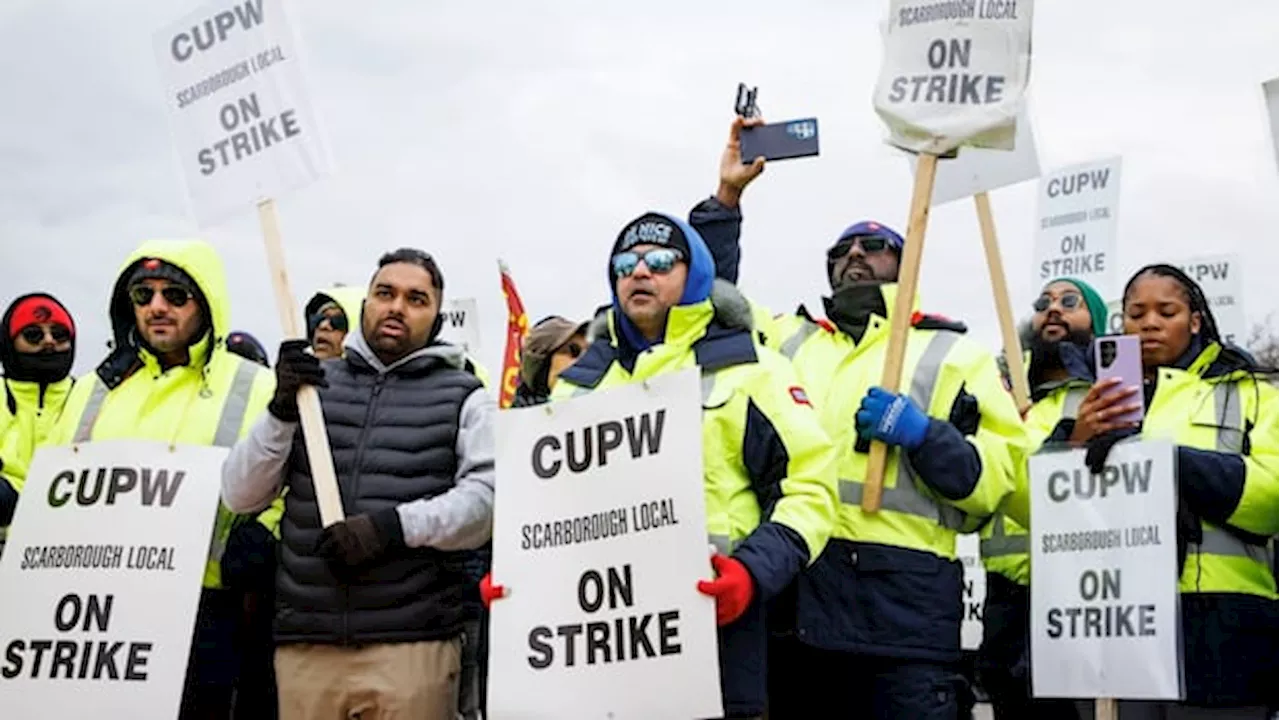 Postal workers on Toronto picket line react as Ottawa moves to end strike