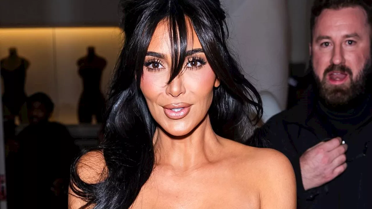 Kim Kardashian's face looks very different at SKIMS opening and fans think they know why