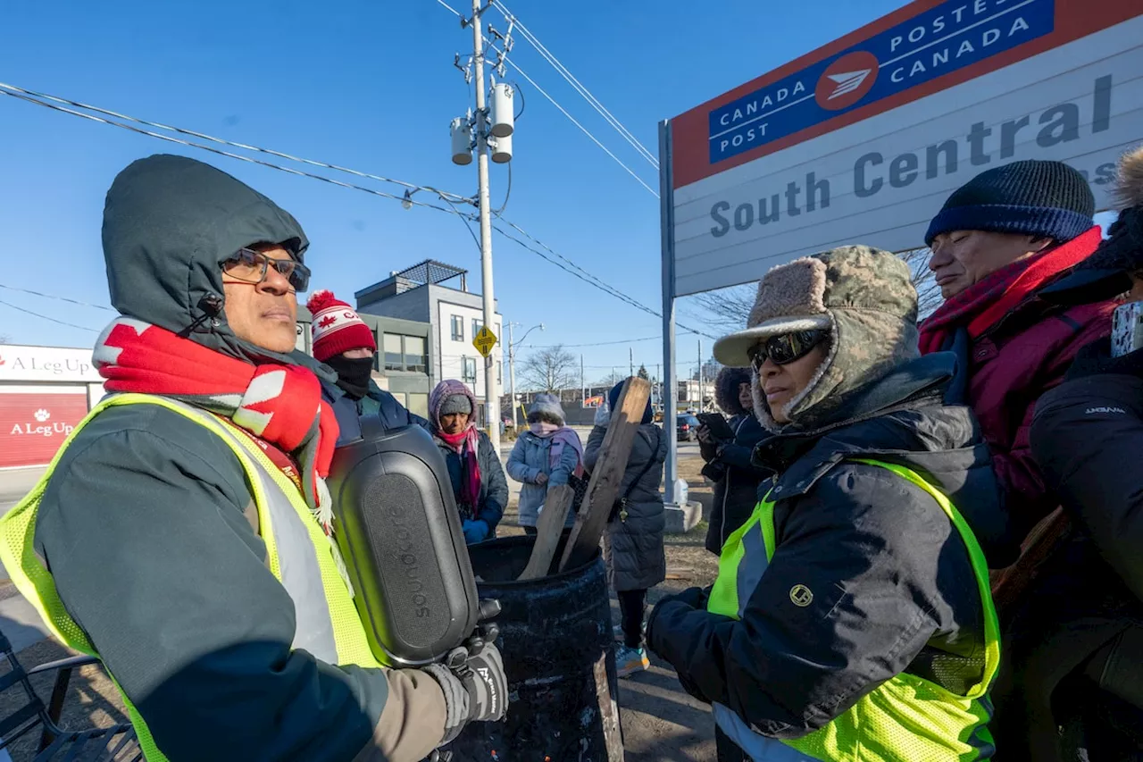 Canada Post workers on picket line react as Ottawa moves to end strike