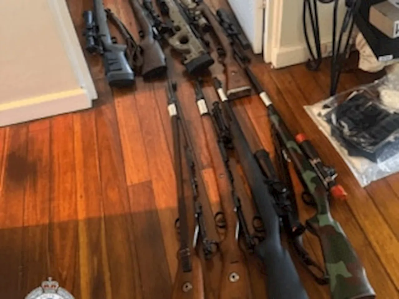 Police charge man after seizing 70 firearms and weapons in Sydney’s north-west