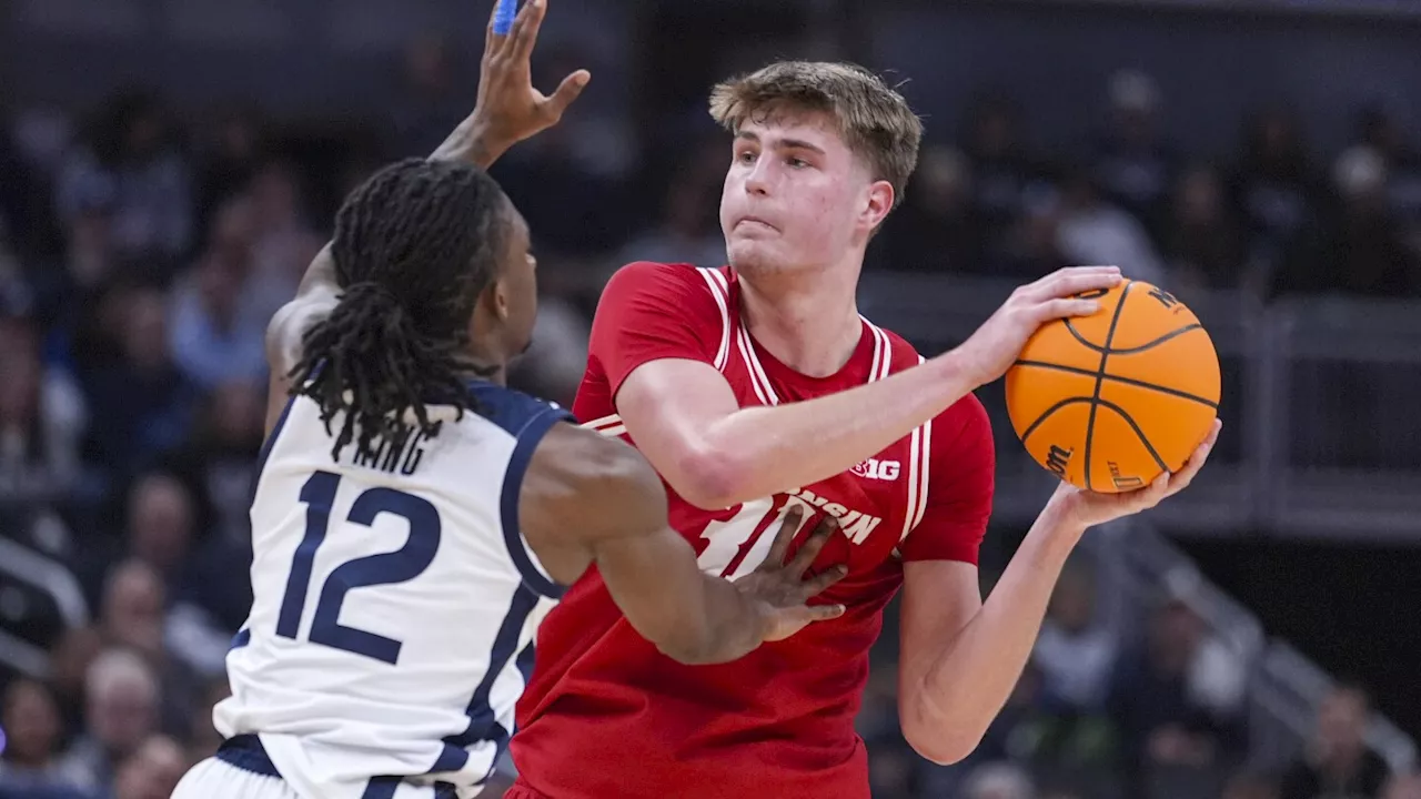 Steven Crowl scores a season-high 20 points to help No. 20 Wisconsin get past Butler 83-74