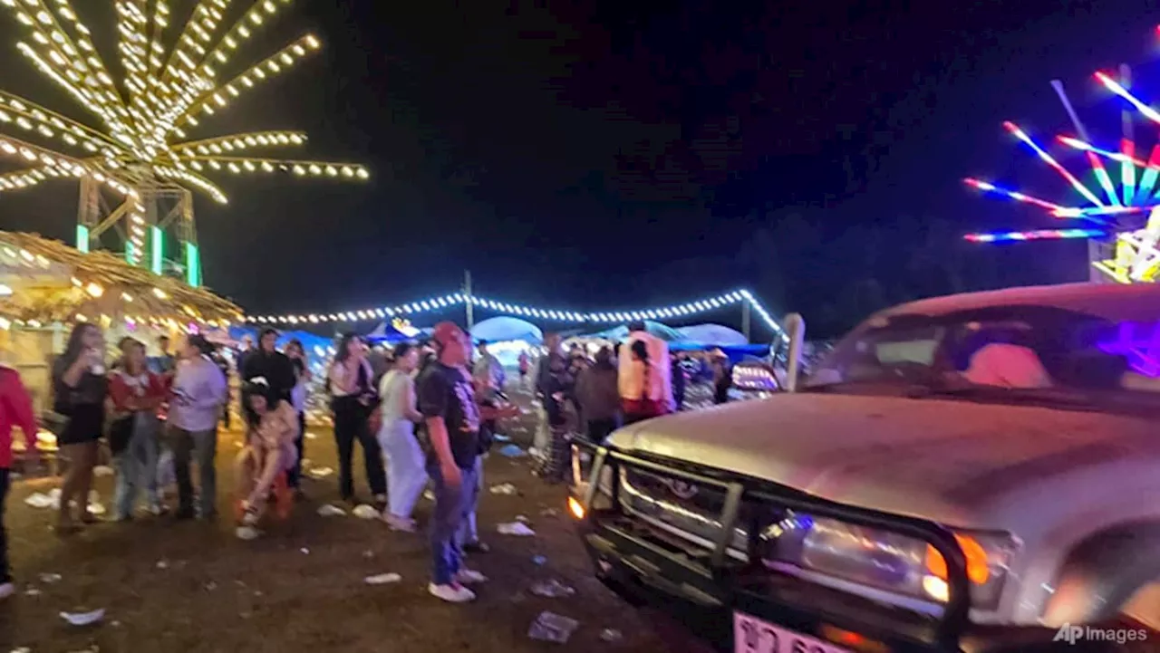 Two detained after bomb kills three at Thai festival