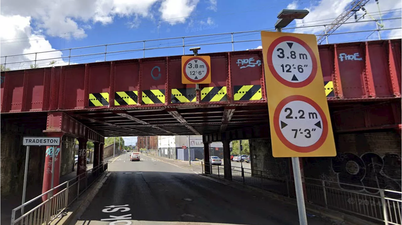 Eight injured and one fighting for life after double-decker bus hits railway bridge near Glasgow