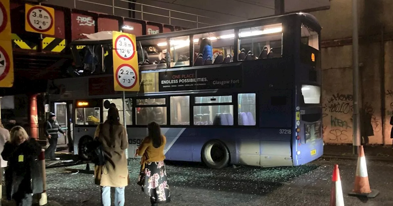 Bus passenger fighting for life after double-decker smashes into bridge