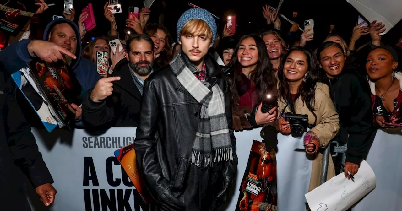 Timothée Chalamet takes method acting to the extreme at Bob Dylan premiere