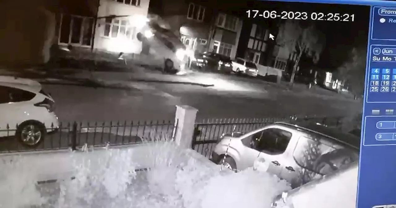 CCTV shows moment driver smashes into lamppost, flips and lands on drive