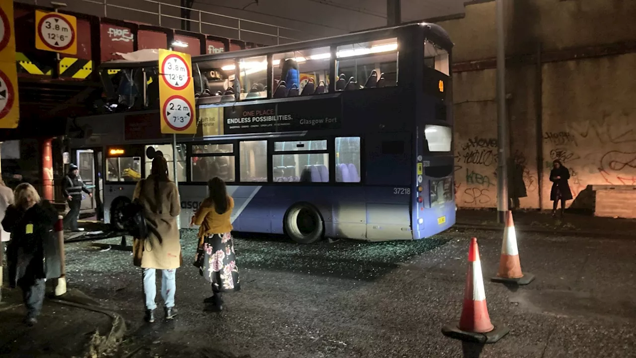 Double-decker bus crashes into bridge in Glasgow as pics show passengers ‘trapped’ on board ...