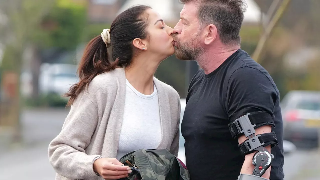 Strictly’s Nick Knowles kisses fiancée Katie Dadzie as he climbs out of car on crutches after knee su...