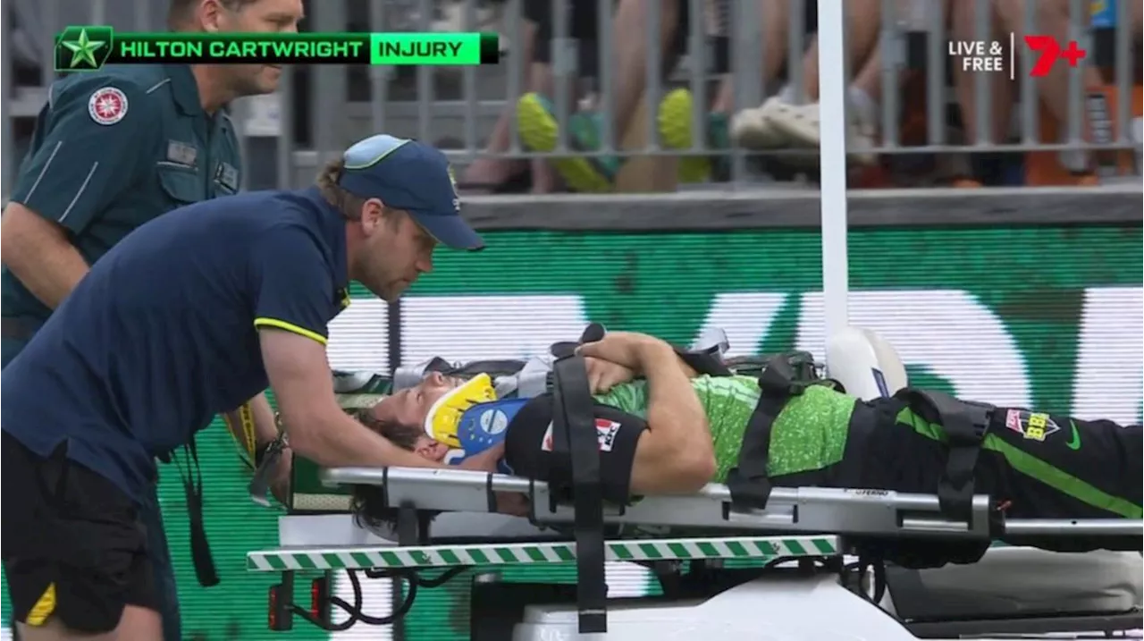 Crowd falls silent as Hilton Cartwright stretchered off with neck injury during BBL opener